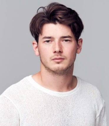 demo-attachment-1568-studio-portrait-of-young-man-with-serious-8YSPPQM